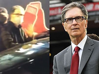 Liverpool's John Henry dodges...